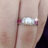 model wearing 2- SIVYAA Solitary pearl framed with white CZ & Square Cut Ruby pure silver Finger Band