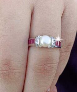 model wearing 2- SIVYAA Solitary pearl framed with white CZ & Square Cut Ruby pure silver Finger Band