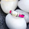 view1-SIVYAA pearl framed with white CZ & Square Cut Ruby pure silver Finger Band