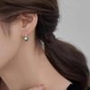 model wearing - SIVYAA Fresh Water Silver Pearl Tiny Drop Dangle pure silver Earrings