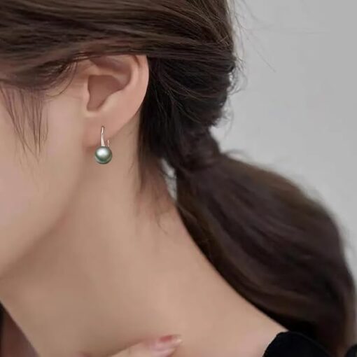 model wearing - SIVYAA Fresh Water Silver Pearl Tiny Drop Dangle pure silver Earrings