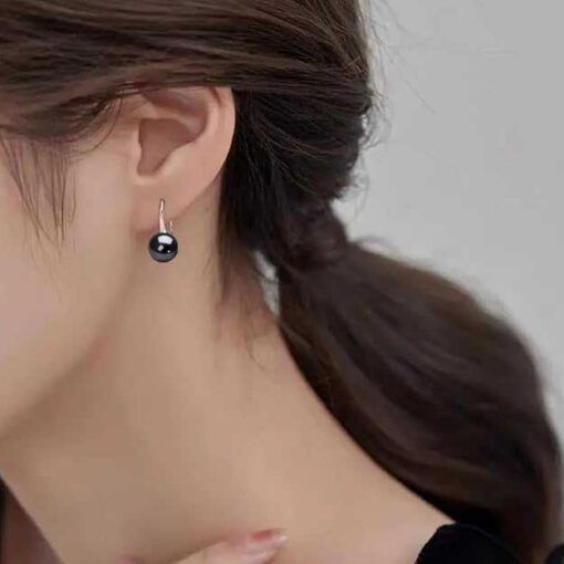 model wearing - SIVYAA Fresh Water Black Pearl Tiny Drop Dangle pure silver Earrings
