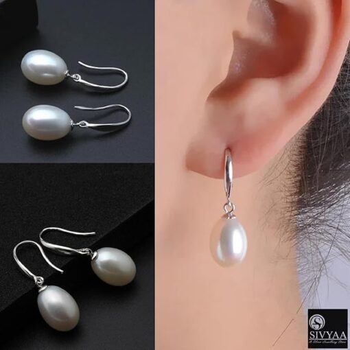 model wearing-SIVYAA Fresh Water White Tear Drop Pearl Hook Dangle Earrings