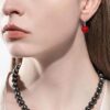 model wearing -SIVYAA Solitaire Classic Red Pearl Drop Dangle Hoop Earrings