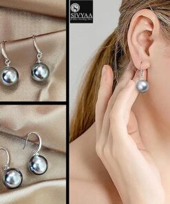 model wearing- SIVYAA Classic Silver Pearl Drop Hook Dangle Earrings