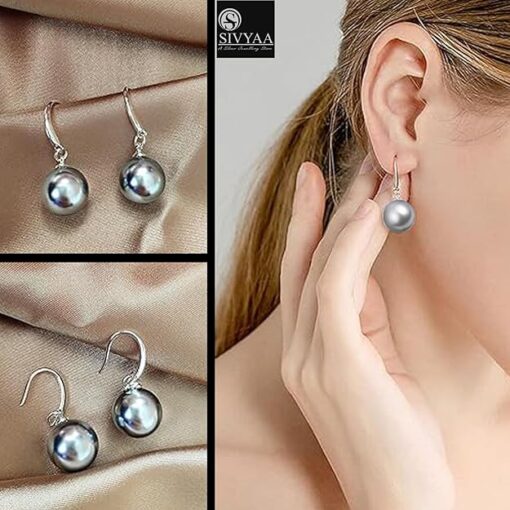model wearing- SIVYAA Classic Silver Pearl Drop Hook Dangle Earrings