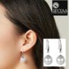 model wearing-SIVYAA Classic White Pearl Drop Hook Dangle Earrings