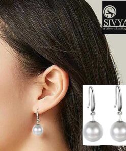model wearing-SIVYAA Classic White Pearl Drop Hook Dangle Earrings