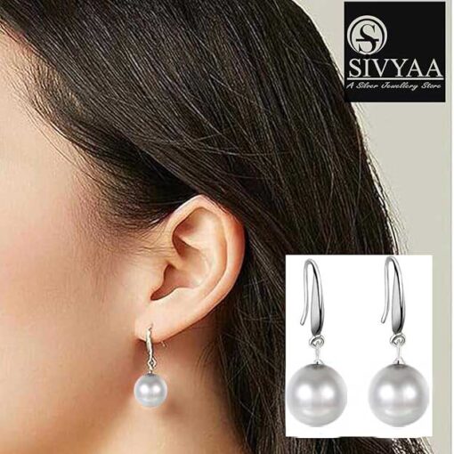 model wearing-SIVYAA Classic White Pearl Drop Hook Dangle Earrings