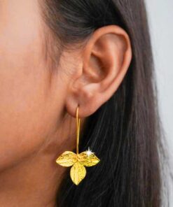 model wearing- SIVYAA handcrafted Gold Plated Tri-Petaled Flower pure silver dangle Earrings