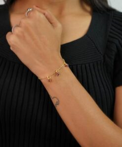 model wearing- SIVYAA Gold Plated Red Maroon Beads Charms pure silver Chain Bracelet