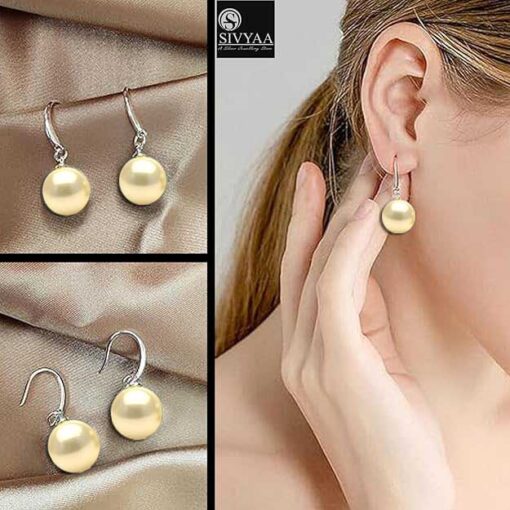 model wearing-SIVYAA Classic Gold Pearl Drop Hook Dangle Earrings