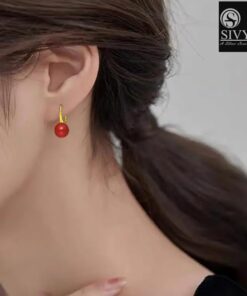 model wearing-SIVYAA gold finish Classic Red Pearl Tiny Drop Dangle Earrings
