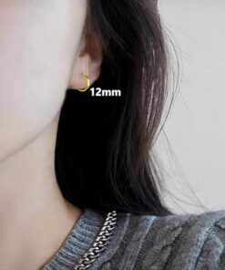 model wearing - SIVYAA flat Gold finish 2mm th silver hoop
