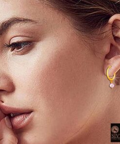 SIVYAA-model wearing- drop pink pearl charm gold finish silver hoop bali