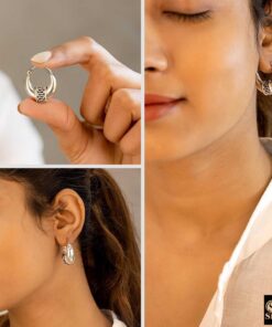 model wearing 3-925 sterling silver oxidized crescent tribal hoop earrings with filigree central design